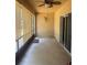 Screened-in patio with plenty of natural light, perfect for entertaining or relaxing in the fresh air at 9833 Hound Chase Dr, Gibsonton, FL 33534