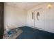 Cozy entryway with a fish pond and a front door with decorative glass at 1009 Andover Cir, Sun City Center, FL 33573