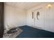 Cozy entryway with a water feature and a front door with decorative glass at 1009 Andover Cir, Sun City Center, FL 33573
