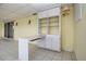 Sunroom featuring a built-in desk and storage cabinets with waterfront views at 1009 Andover Cir, Sun City Center, FL 33573