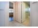 Hallway with closet leading to bedroom and bathroom at 1009 Andover Cir, Sun City Center, FL 33573
