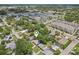 Detailed aerial view of home's location within a vibrant residential community, with surrounding streets at 1015 13Th Nw Ave, Largo, FL 33770