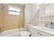 Cozy bathroom featuring neutral tile, updated fixtures, and a modern vanity at 1015 13Th Nw Ave, Largo, FL 33770