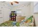 Cozy Bedroom with colorful decor, dresser, and themed area rug for children at 1015 13Th Nw Ave, Largo, FL 33770