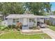 Delightful single-story home with fresh paint, landscaping and covered parking at 1015 13Th Nw Ave, Largo, FL 33770