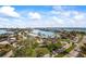 Aerial view of a waterfront community with bay views and manicured landscaping at 10355 Paradise Blvd # 1003, Treasure Island, FL 33706