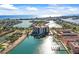 Wonderful aerial view showcases the building's waterfront location and panoramic vistas at 10355 Paradise Blvd # 1003, Treasure Island, FL 33706