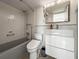 Updated bathroom featuring modern fixtures, white subway tile, and a combined tub and shower at 10355 Paradise Blvd # 1003, Treasure Island, FL 33706