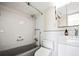 Updated bathroom featuring modern fixtures, white subway tile, and a combined tub and shower at 10355 Paradise Blvd # 1003, Treasure Island, FL 33706