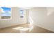 Bright bedroom with terrazzo flooring and two windows with stunning water views at 10355 Paradise Blvd # 1003, Treasure Island, FL 33706