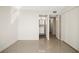Bright bedroom featuring an ensuite bathroom and spacious closet space for optimal storage at 10355 Paradise Blvd # 1003, Treasure Island, FL 33706