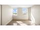 Bright bedroom features terrazzo flooring and two windows with stunning water views at 10355 Paradise Blvd # 1003, Treasure Island, FL 33706