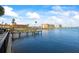 The waterfront property features a private dock with easy access to water activities at 10355 Paradise Blvd # 1003, Treasure Island, FL 33706