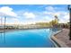 Inviting waterfront pool with serene views and clear blue water for relaxation at 10355 Paradise Blvd # 1003, Treasure Island, FL 33706