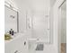 Stylish bathroom with a walk-in shower, modern vanity, and elegant tile flooring at 10538 Juliano Dr, Riverview, FL 33569