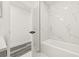 Bathroom featuring marble tile in the shower and modern fixtures at 1128 Eau Claire Cir, Tampa, FL 33619