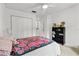 Bright bedroom with a ceiling fan, closet, and comfortable furnishings at 1139 43Rd N Ave, St Petersburg, FL 33703