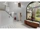 Grand entryway features a high ceiling, tile floors, and large window for lots of natural light at 1139 43Rd N Ave, St Petersburg, FL 33703