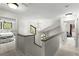 Upstairs hallway boasts modern lighting and views to other rooms of the home at 1139 43Rd N Ave, St Petersburg, FL 33703