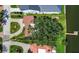 Property includes mature trees and waterfront access with dock at 1238 Monterey Ne Blvd, St Petersburg, FL 33704