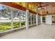 Spacious sunroom with tile floors and lots of natural light and water views at 1238 Monterey Ne Blvd, St Petersburg, FL 33704