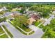 Neighborhood shot showing a house with terracotta roof at 12470 93Rd St, Largo, FL 33773
