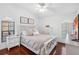 Bedroom with wood floors, a ceiling fan, and neutral décor at 12470 93Rd St, Largo, FL 33773