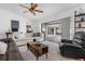 Open living area with a view of the outdoor patio and pool, creating a seamless indoor-outdoor living experience at 12470 93Rd St, Largo, FL 33773