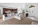Stylish open-concept living area, seamlessly integrating the kitchen, dining space, and entryway at 12470 93Rd St, Largo, FL 33773