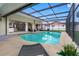Beautiful pool area with lounging, seamless indoor-outdoor living, and a peaceful retreat for relaxation at 12470 93Rd St, Largo, FL 33773