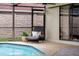 Enjoy this outdoor lounge area by the pool at 12470 93Rd St, Largo, FL 33773