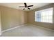 Bedroom with a window and tile floors, light and airy at 13235 Sanctuary Cove Dr # 201, Temple Terrace, FL 33637