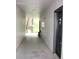 Exterior hallway with stairs and elevators leading to units at 13235 Sanctuary Cove Dr # 201, Temple Terrace, FL 33637