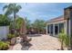 Paver patio featuring a barbecue area and lots of room for entertaining at 14711 Potterton Cir, Hudson, FL 34667