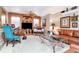 Stylish living room with built-in cabinetry, comfortable seating, and elegant decor at 14711 Potterton Cir, Hudson, FL 34667