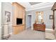 Elegant main bedroom features a sitting area with built-in storage at 14711 Potterton Cir, Hudson, FL 34667