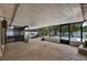Screened-in lanai with paver flooring and view of the pool at 15108 Springview St, Tampa, FL 33624