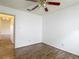 Bedroom featuring hardwood floors and a ceiling fan at 1517 Gunsmith Dr, Lutz, FL 33559