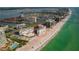 Aerial view of a beachfront building located next to the ocean at 1586 Gulf Blvd # 2502, Clearwater, FL 33767