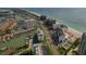 Expansive aerial shot featuring oceanfront condos, beach and coastal waterways at 1586 Gulf Blvd # 2502, Clearwater, FL 33767