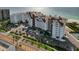High-angle of stunning beachfront condos, palm trees and ocean views at 1586 Gulf Blvd # 2502, Clearwater, FL 33767