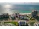 Aerial view of a beachfront building on the ocean with beach access at 1586 Gulf Blvd # 2502, Clearwater, FL 33767