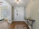 Inviting foyer with hardwood floors, elegant decor, and a glimpse into the bright living area at 1586 Gulf Blvd # 2502, Clearwater, FL 33767
