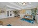 This lobby features coastal decor, tile floors, and comfortable wicker seating for guests at 1586 Gulf Blvd # 2502, Clearwater, FL 33767