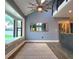 Bright dining area boasts natural light from a large window seat with backyard view and access to the kitchen at 1608 20Th W Ave, Palmetto, FL 34221