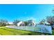 Charming two-story home featuring solar panels and a beautiful white picket fence at 1608 20Th W Ave, Palmetto, FL 34221