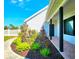 Charming front porch with brick flooring and tasteful landscaping at 1608 20Th W Ave, Palmetto, FL 34221