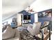 Loft with vaulted ceiling, comfortable seating area, and unique decor at 1608 20Th W Ave, Palmetto, FL 34221