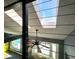 Loft with skylight, view to a ceiling fan, and a dining nook at 1608 20Th W Ave, Palmetto, FL 34221