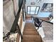 Staircase with modern railing leads up to the second floor of the house at 1608 20Th W Ave, Palmetto, FL 34221